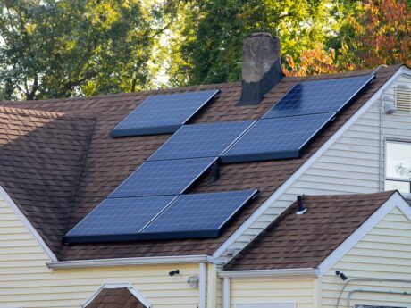 Solar pv panels on roof of home in autumn